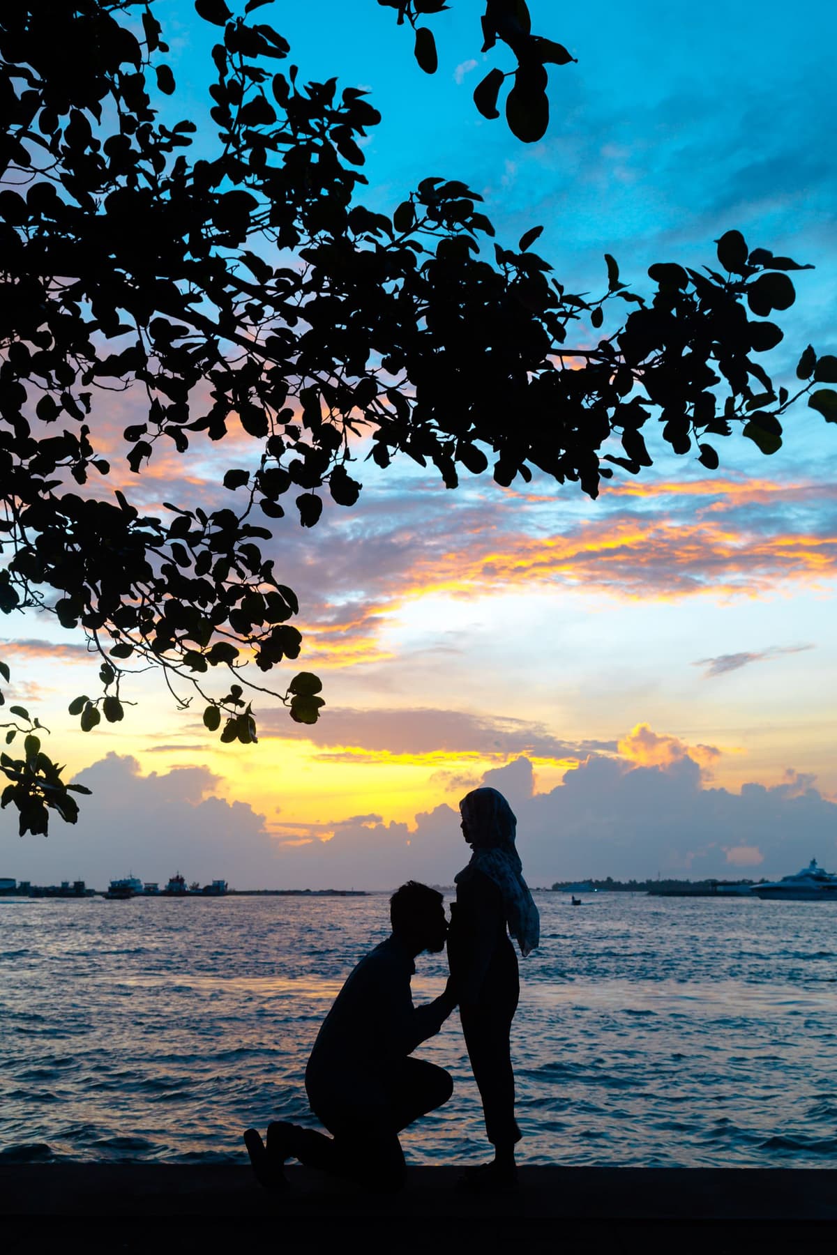 Golden hour connection — a couple silhouetted at sunset